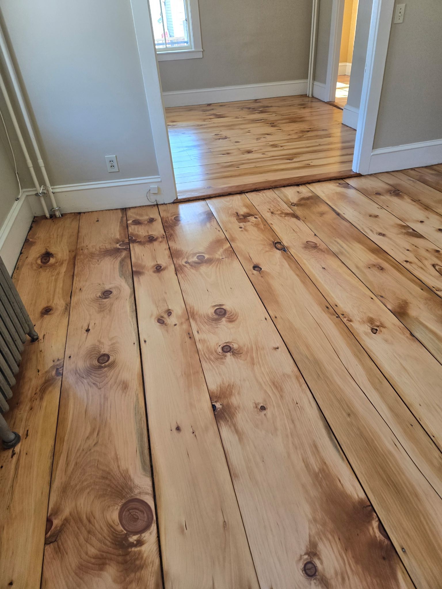 Beautifully restored maple floors with satin finish